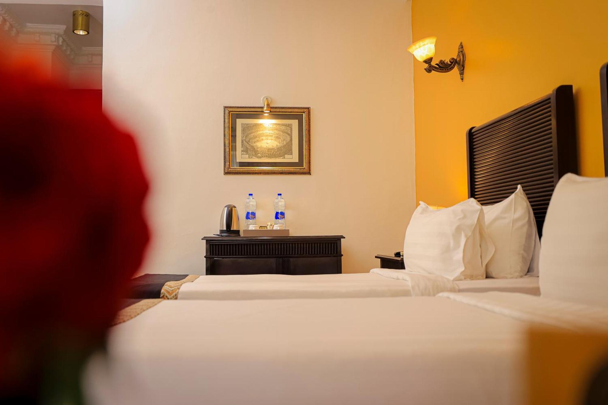 Colosseum Boutique Hotel & Spa Дар-эс-Саламе Номер фото